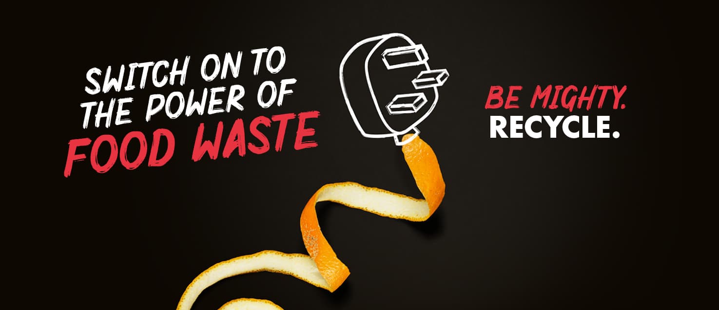 Chalk drawn electric three pin plug with an orange peel cable on a black background with the words "Switch on to the power of food waste" and "Be Mighty. Recycle."